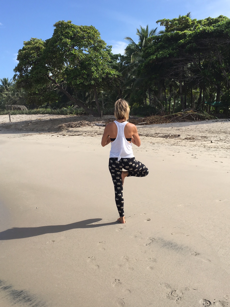 Yoga pose on a beach